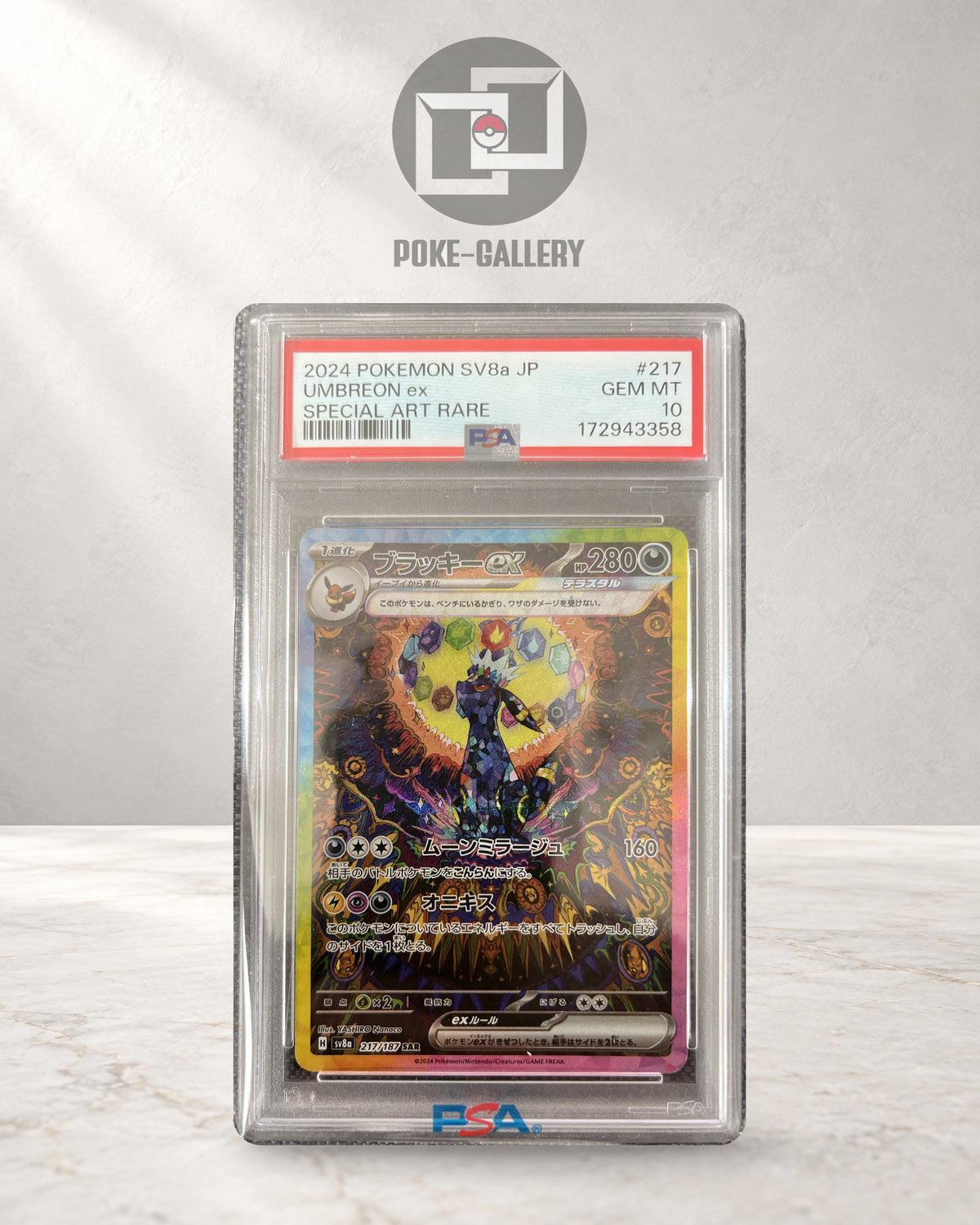 Beispielbild: Nachtara / Umbreon ex 217/187 aus Terastal Festival ex, japanische Pokémon-Karte im PSA-10-Slab vor dem POKE-GALLERY-Logo. CERT im Foto: 172943358.