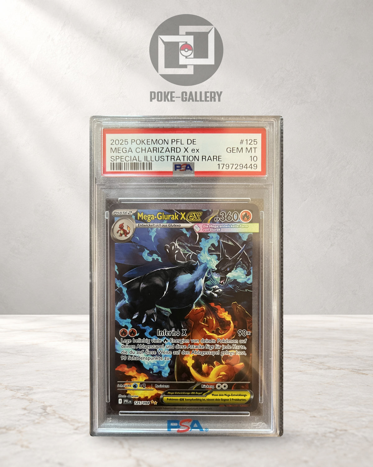 Deutsches Mega Glurak X ex 125/094 aus Fatale Flammen im PSA-10-Slab, CERT 179729449, mit blauen und orangefarbenen Flammen.